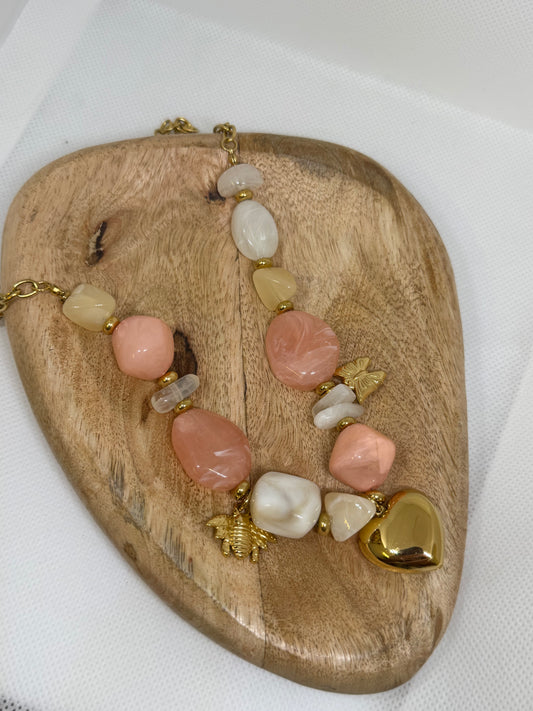Collier en acier inoxydable perle en résine et pampilles (2 couleurs)