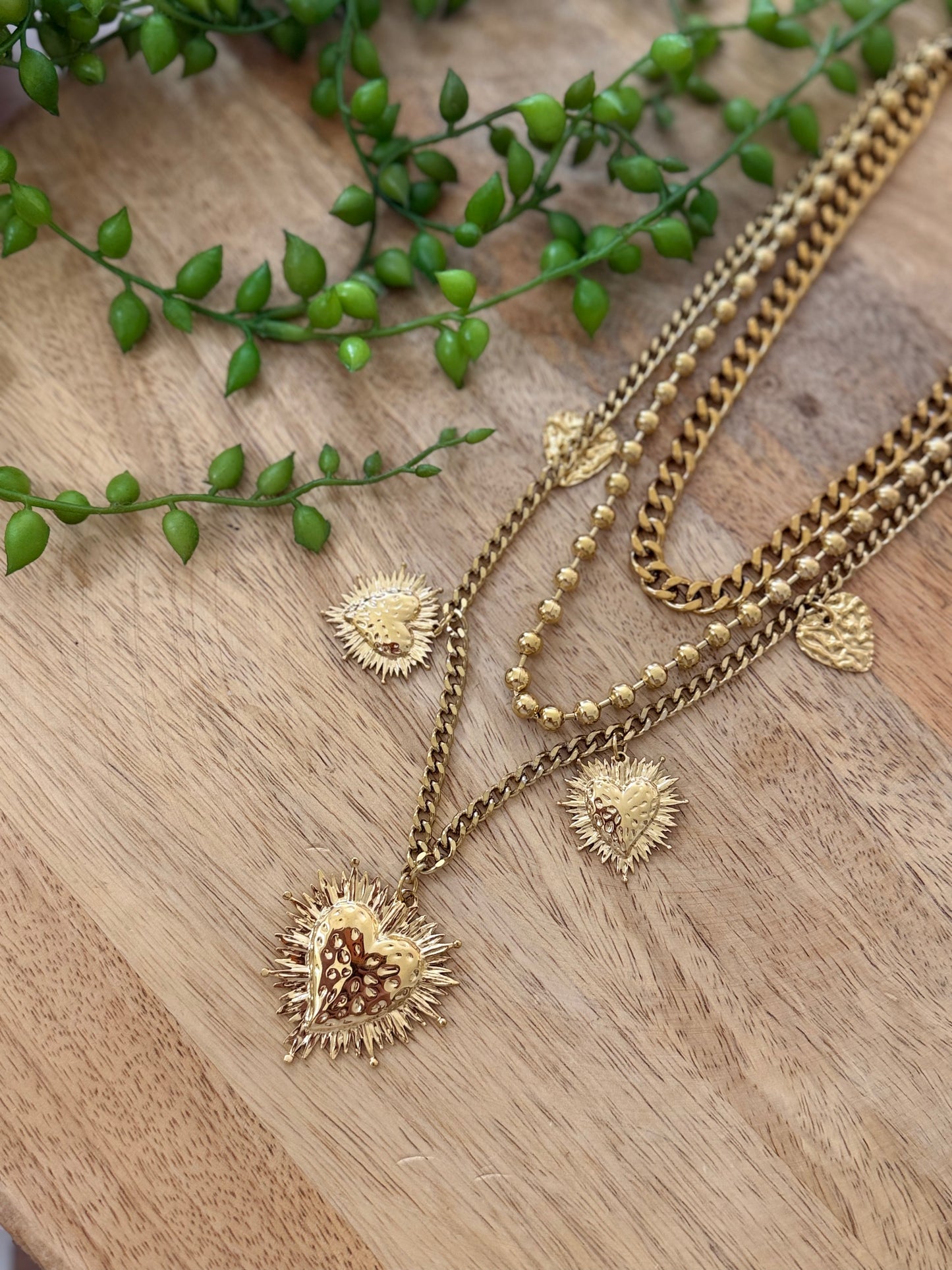 Collier doré multi-rang avec cœur