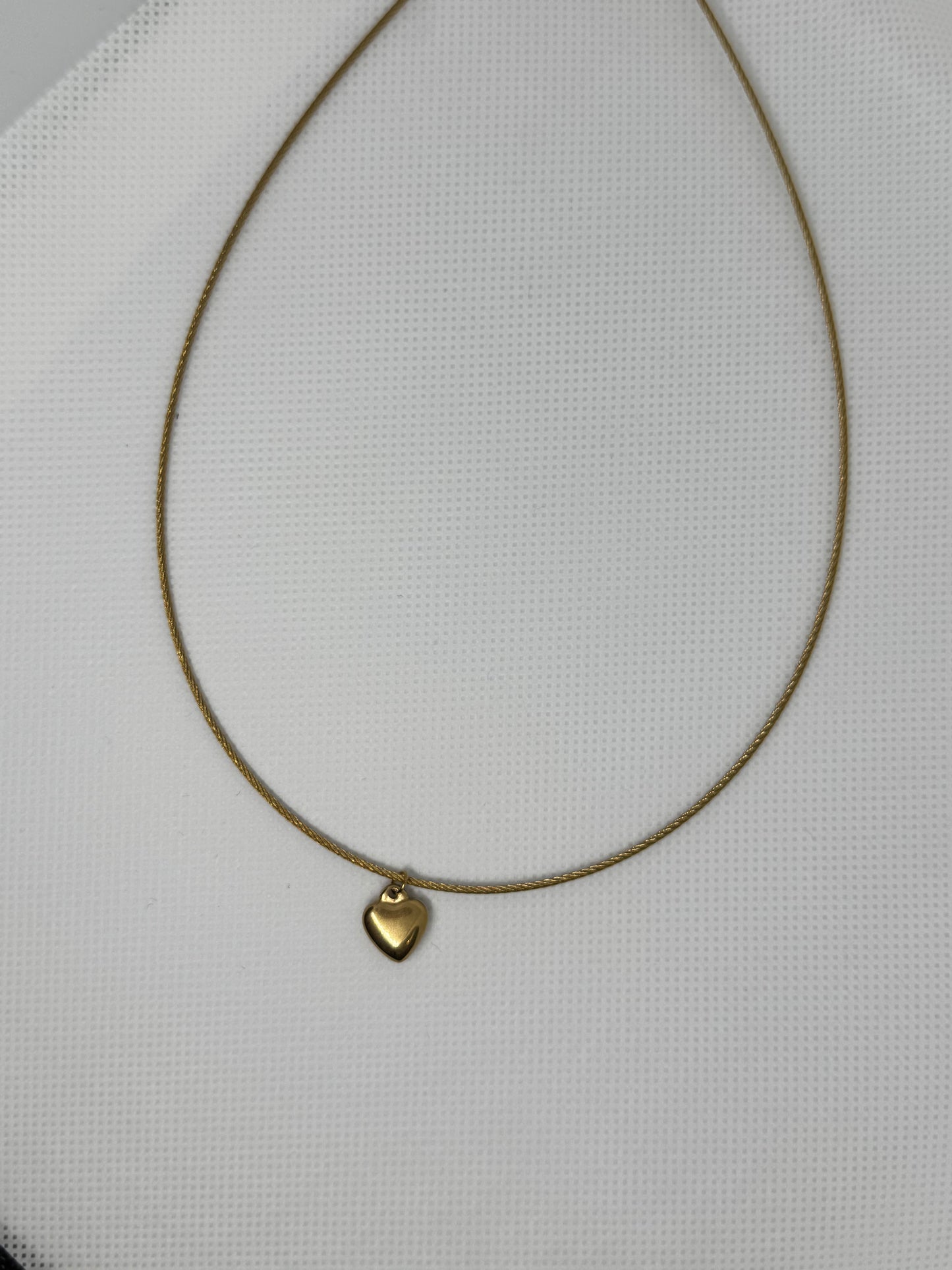 Collier rigide en acier inoxydable avec pendentif cœur