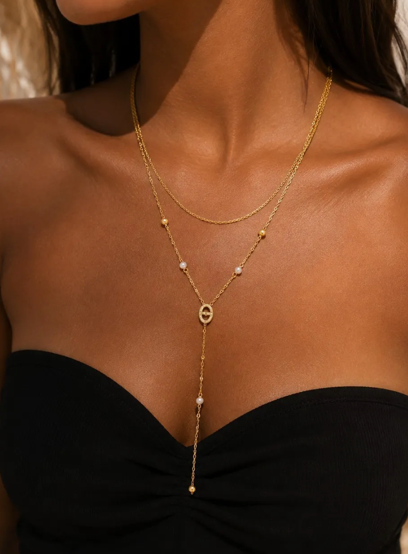 Collier long motif ovale raffiné en forme Y
