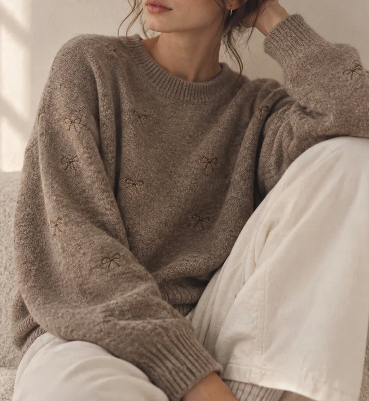 Pull avec motif noeud taille unique 36 au 44/46 (2 couleurs)