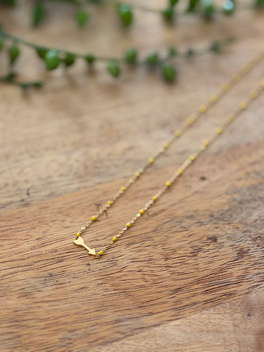 Collier doré boule jaune & pendentif flèche