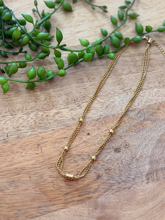 Collier doré triple
