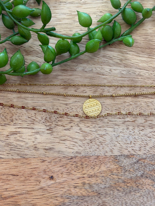 Collier doré triple