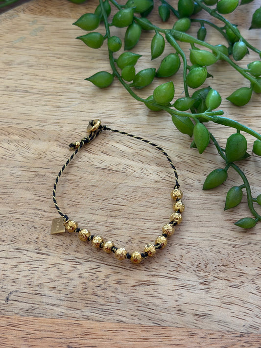 Bracelet doré et noir