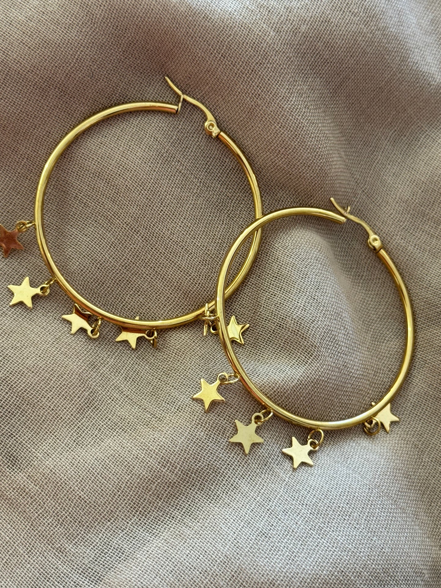 Créoles dorées étoile en acier inoxydable