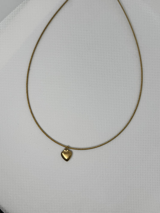 Collier rigide en acier inoxydable avec pendentif cœur