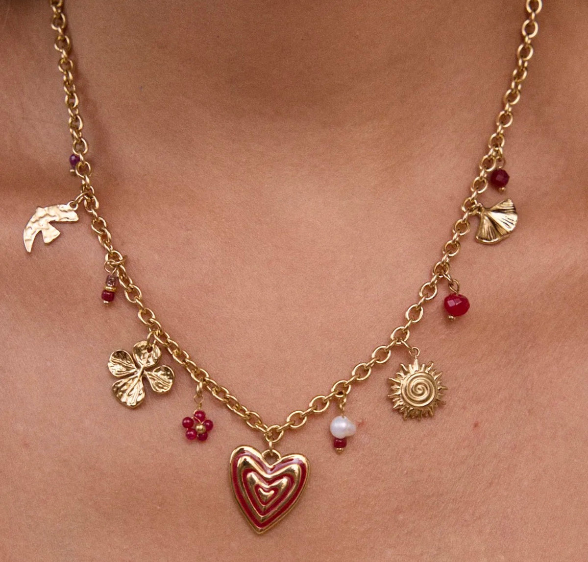 Collier soleil, coeur, trèfle et perles