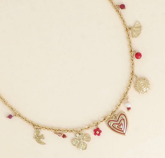 Collier soleil, coeur, trèfle et perles